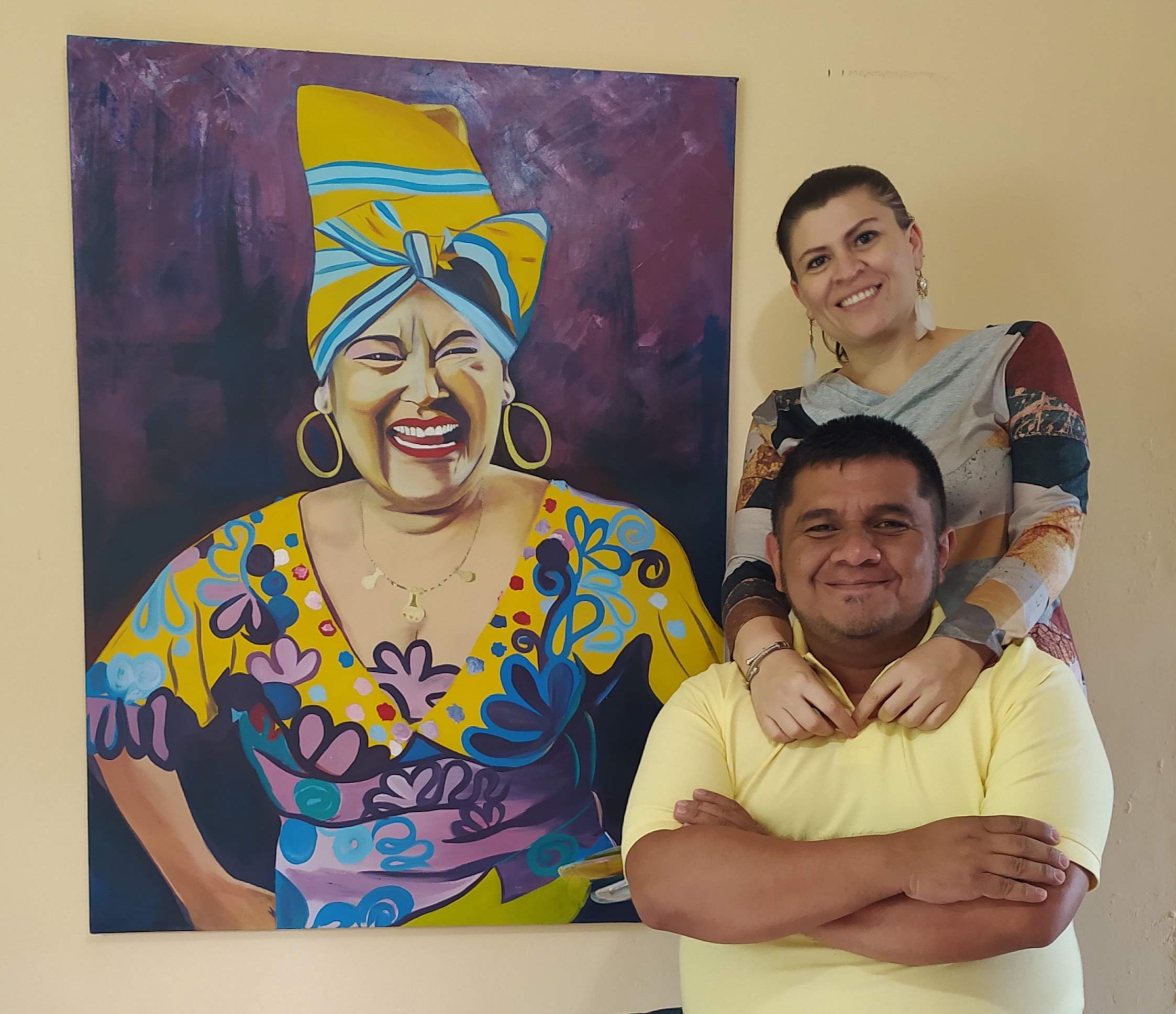 Un pregón para Totó la Momposina Jaiber Ladino junto a una pintura del rostro de Totó la Momposina